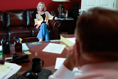 Attorney joel hamner explains a nursing home exhibit to a client, documenting neglect evidence.