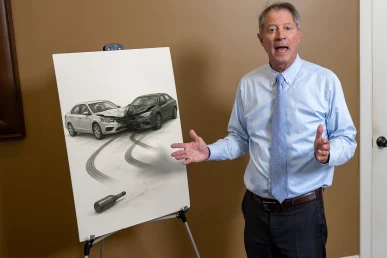 Attorney tom mccutcheon reviewing a drunk driving accident exhibit for a new case.