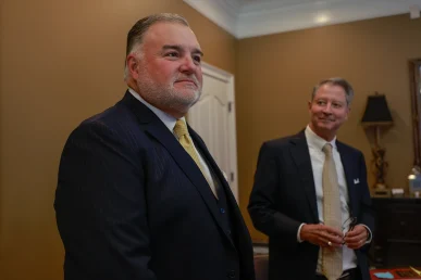 Joel hamner and tom mccutcheon discuss a dangerous work site injury caused by unsafe construction practices.