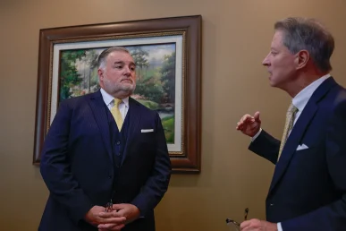 Joel hamner and tom mccutcheon review driver logs for a grubhub delivery vehicle crash lawsuit.