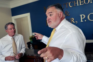 Joel hamner and tom mccutcheon strategize on a claim involving permanent vision impairment.