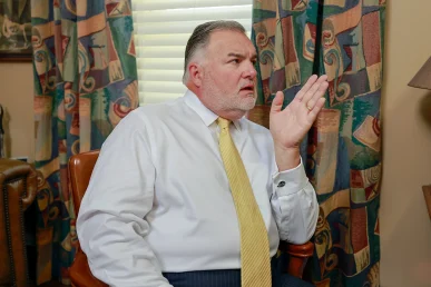 Joel hamner joins tom mccutcheon to discuss a minor fender bender case with a client.