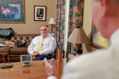 Joel hamner joins tom mccutcheon to discuss a multiple vehicle collision claim with a client.
