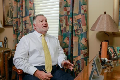 Joel hamner joins tom mccutcheon to evaluate a defective tire claim with a client.