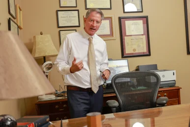 Joel hamner joins tom mccutcheon to evaluate a drunk driving accident lawsuit with a client.