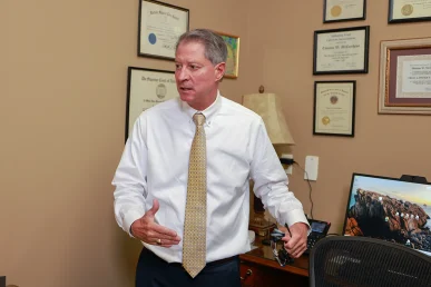 Joel hamner joins tom mccutcheon to talk with a client about a freeway accident claim.