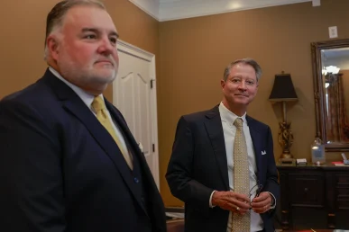 Lawyer joel hamner and tom mccutcheon consult on a childcare center negligence case after a serious child injury.