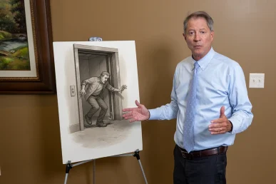 Lawyer thomas mccutcheon presents an exhibit for an elevator accident case.