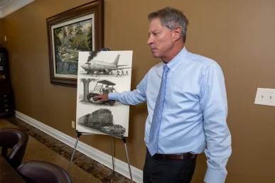 Lawyer tom mccutcheon explains a broad exhibit covering several unusual vehicle accidents.