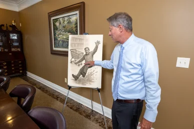 Lawyer tom mccutcheon explains a premises liability exhibit focused on unsafe flooring conditions.
