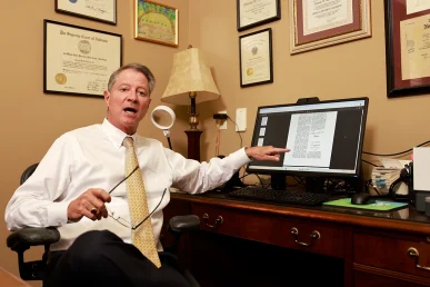 Lawyers joel hamner and tom mccutcheon review traffic signal data for a busy intersection crash case.