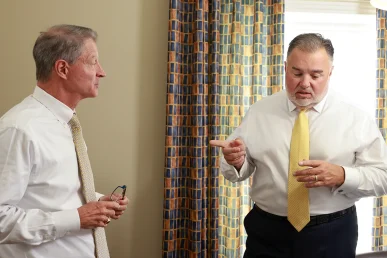 Lawyers tom mccutcheon and joel hamner assess work site safety lapses in a crane collapse case.