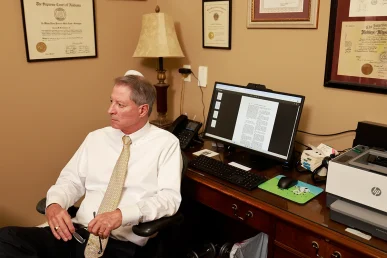 Lawyers tom mccutcheon and joel hamner strategize on recovery after a collision with an uninsured motorist.