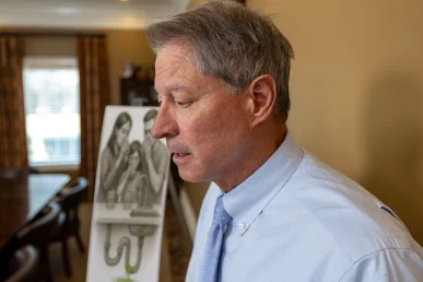 Personal injury attorney tom mccutcheon consults with a client about a water contamination injury claim.