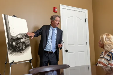 Personal injury attorney tom mccutcheon meets with a client to address a catastrophic injury claim.