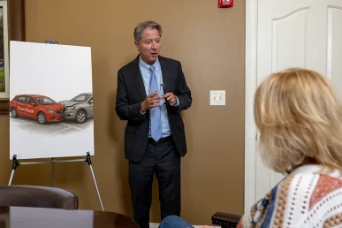 Personal injury attorney tom mccutcheon talks with a client about a doordash accident claim.