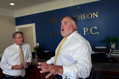 Tom mccutcheon and joel hamner review delivery vehicle crash data for a ups collision lawsuit.