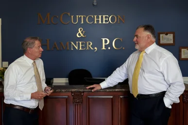 Tom mccutcheon and joel hamner strategize on a moving van crash and cargo loss lawsuit.