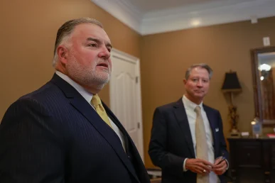 Tom mccutcheon and attorney joel hamner strategize on a life changing injury claim requiring extensive medical care.
