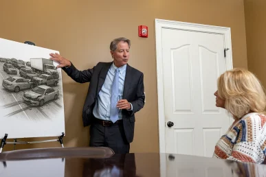 Tom mccutcheon meets with a client to evaluate a freeway accident claim.