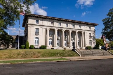 Front entrance of the historic Florence Alabama courthouse with tall columns