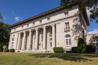 Historic Florence courthouse with American flag on flagpole