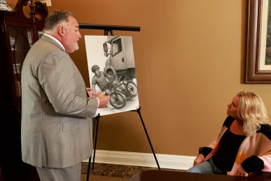Joel Hamner talking with a client about bicycle accident lawyer in Florence Alabama