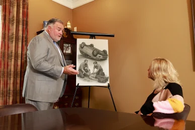 Joel Hamner talking with a client about catastrophic injury legal services in Florence Alabama