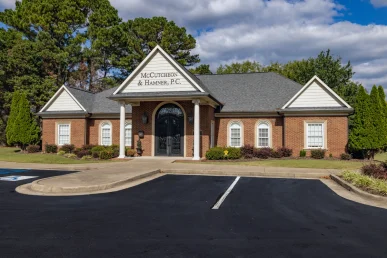 Social Security Disability lawyers McCutcheon and Hamner's law office signage in Florence, Alabama.
